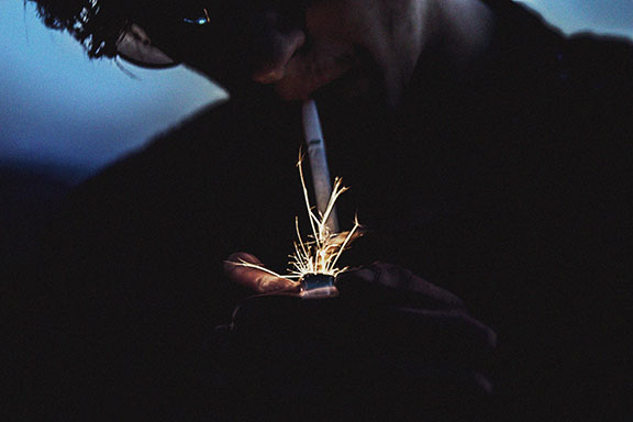 Man Lighting a Cigarette